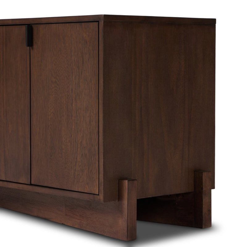 Castillo Media Console Chestnut Parawood Angled Base View Four Hands