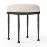 Corinne Accent Stool Crete Pebble Angled View Four Hands