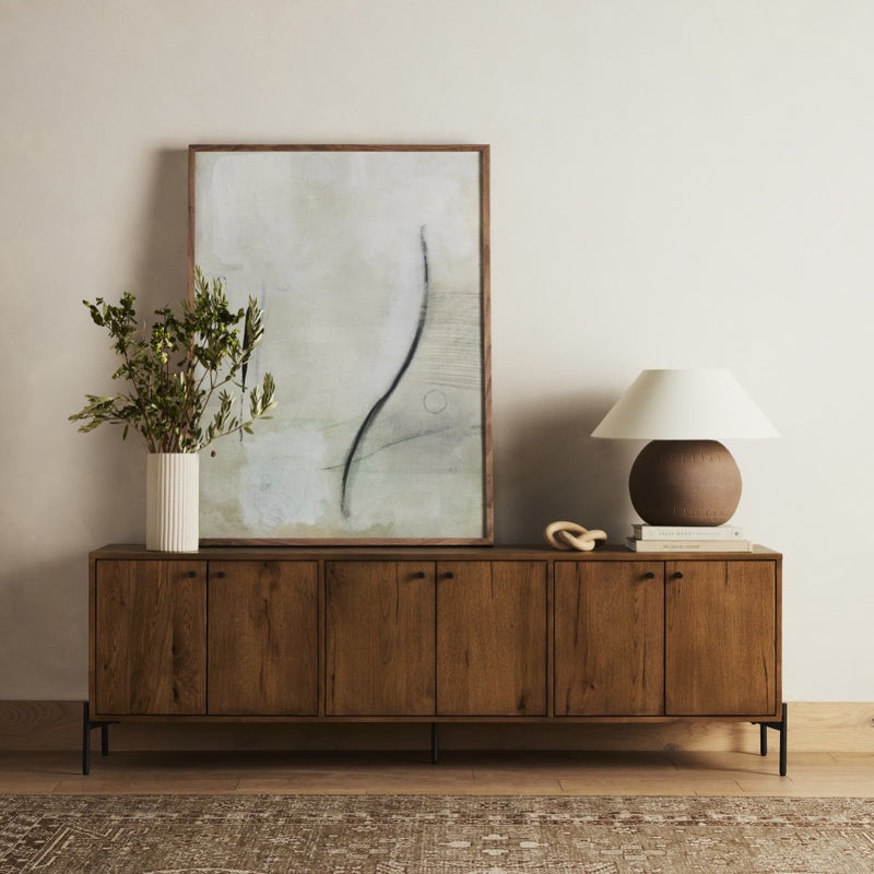 Eaton Media Console Amber Oak Resin Staged View Four Hands