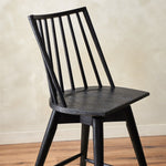 Four Hands Lewis Swivel Counter Stool Black Oak Staged View