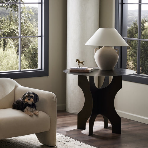 Four Hands Round Side Table In Solid Iron Staged View