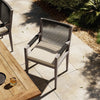 Sherwood Outdoor Dining Armchair Faye Sand Staged View Four Hands