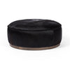 Four Hands Sinclair Large Round Ottoman Black Hair on Hide Side View