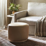 Four Hands Sinclair Round Ottoman Burlap Staged View