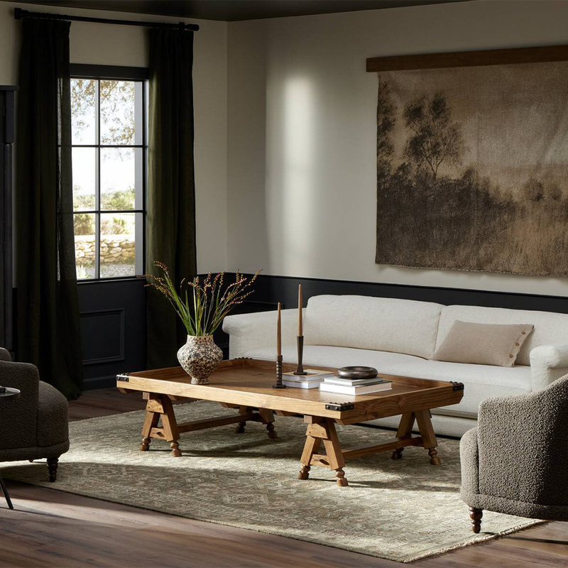 The Don't Try To Explain It Table Distressed Brown Veneer Staged View in Living Room Four Hands