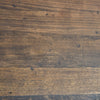 Four Hands Bronx Dining Table up close view of reclaimed wood