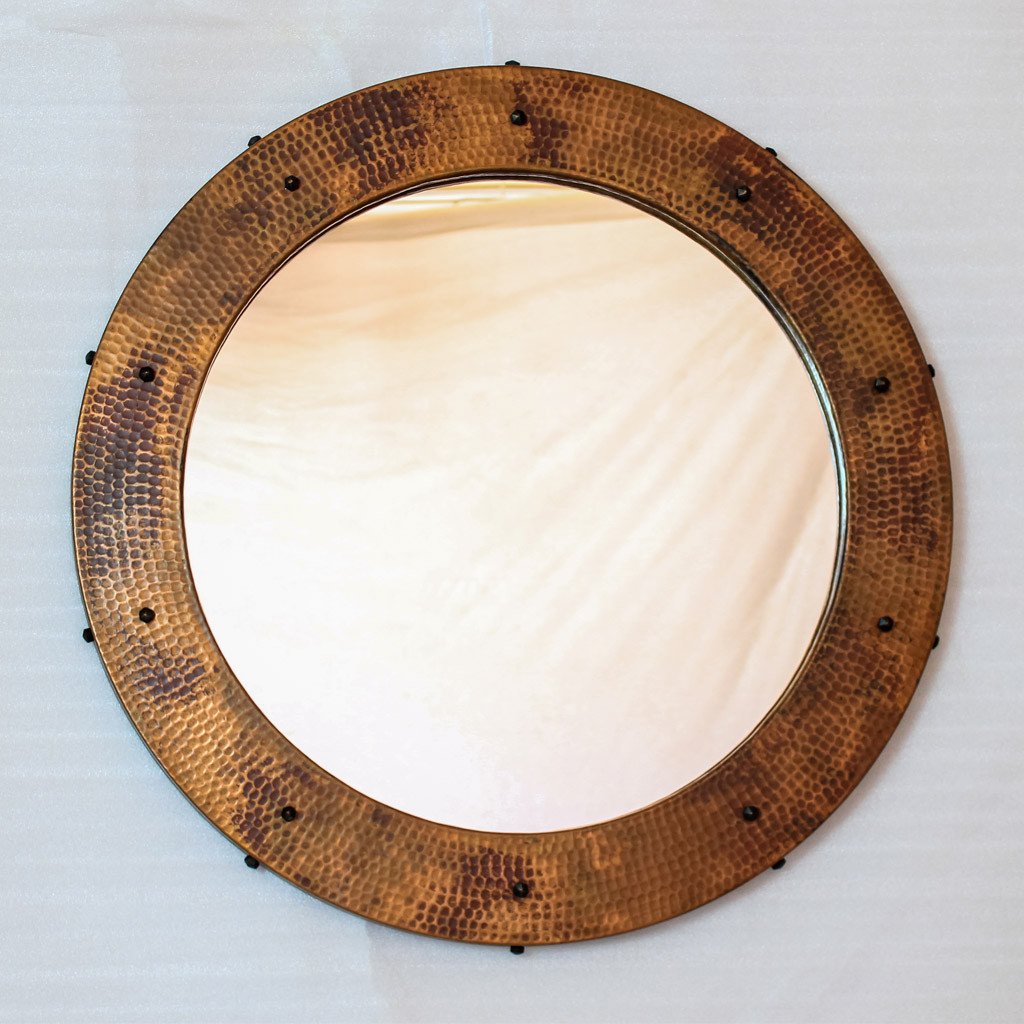 Round hammered copper mirror