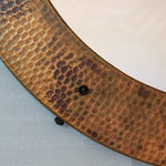 Round hammered copper mirrors