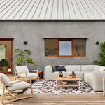 Four Hands Lane Outdoor Chair Faye Sand Staged Shot on Outdoor Patio