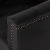 Maxx Swivel Chair close up view aged bronze nailheads